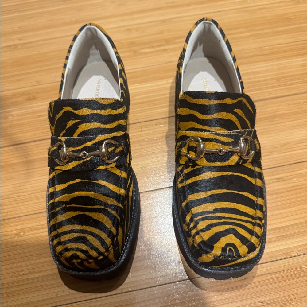 Intentionally blank animal print loafer
